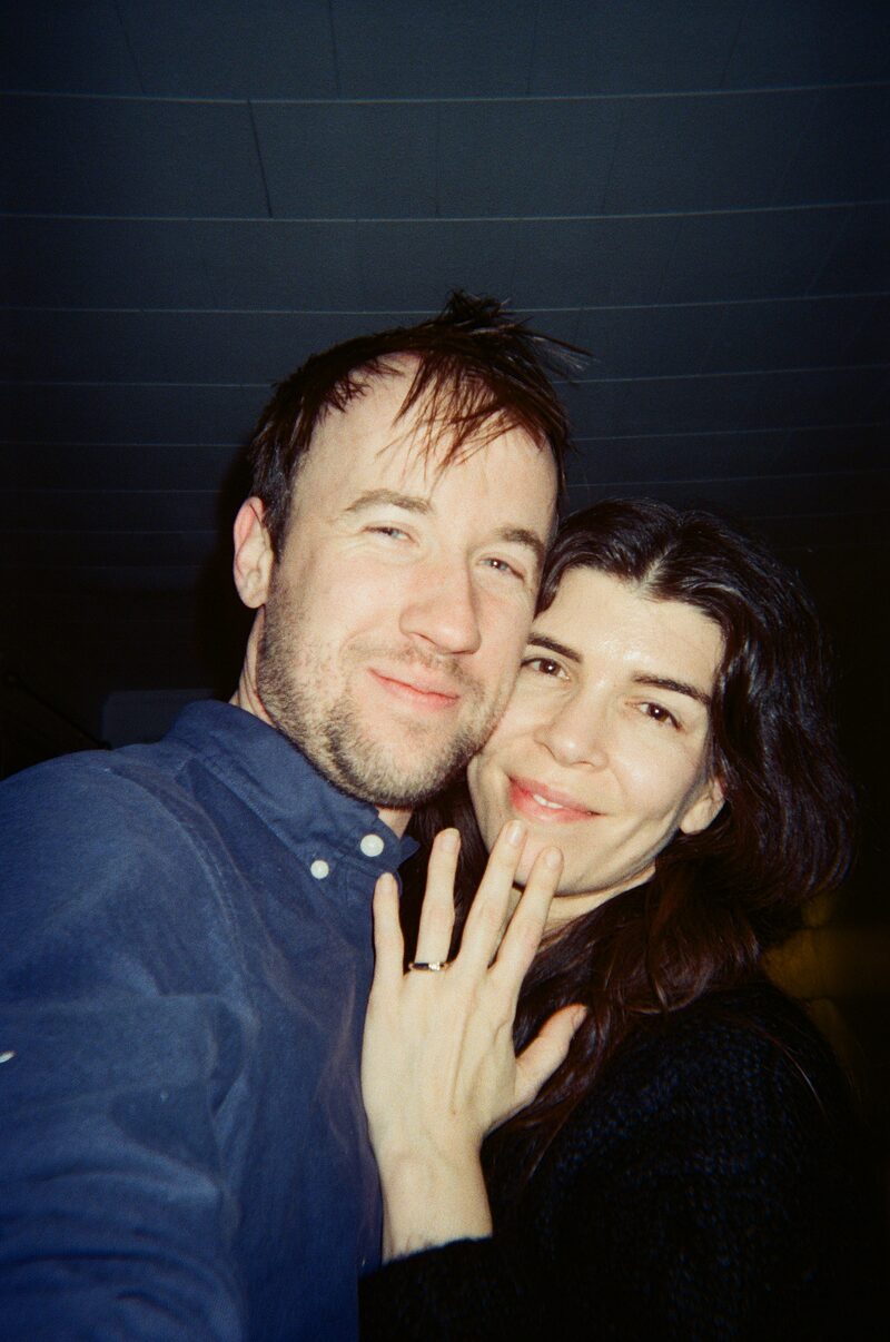 Alexa and Harrison cheek to cheek, Alexa's engagement ring showing